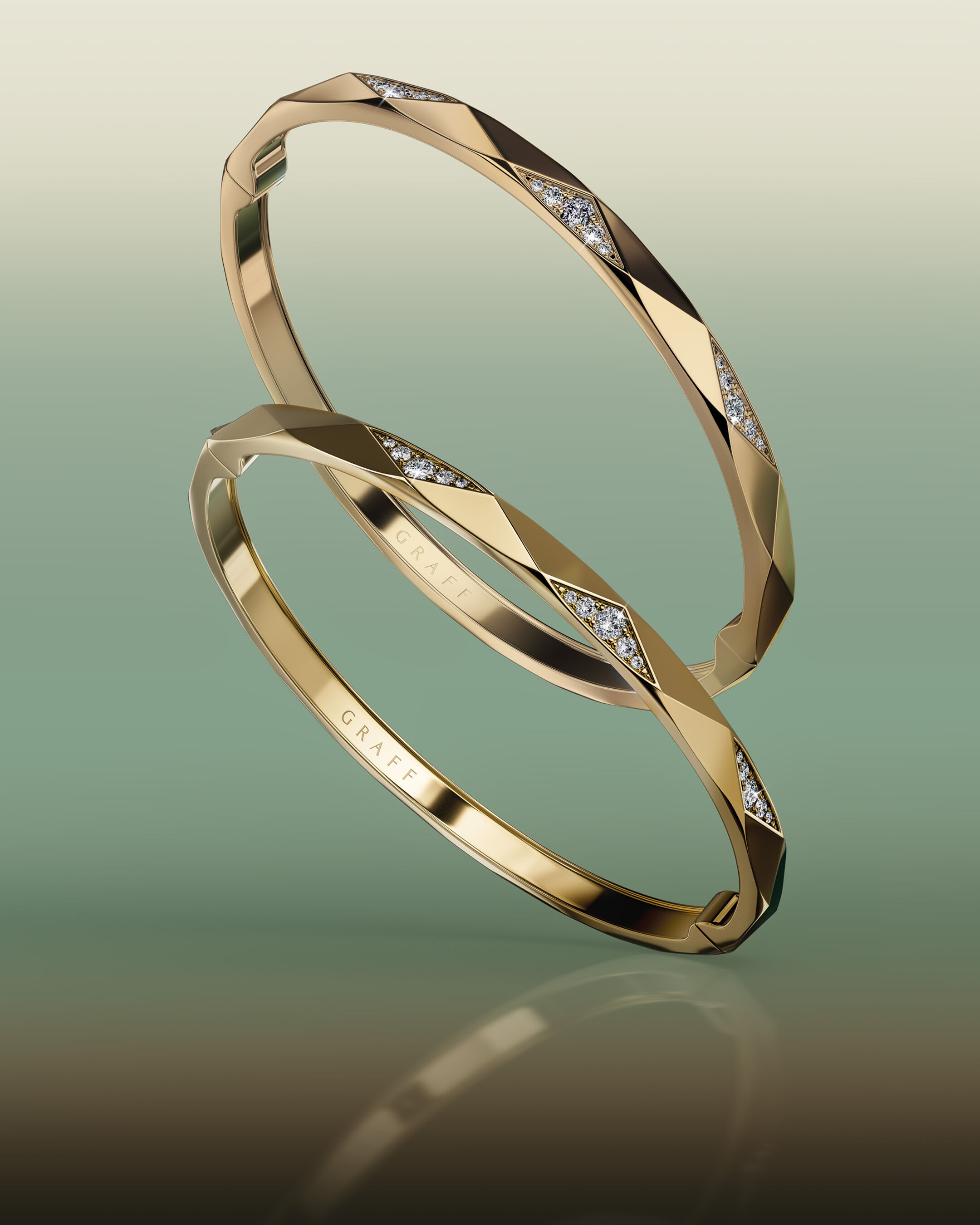 Image shows model wearing Laurence Graff Signature bangles and rings 