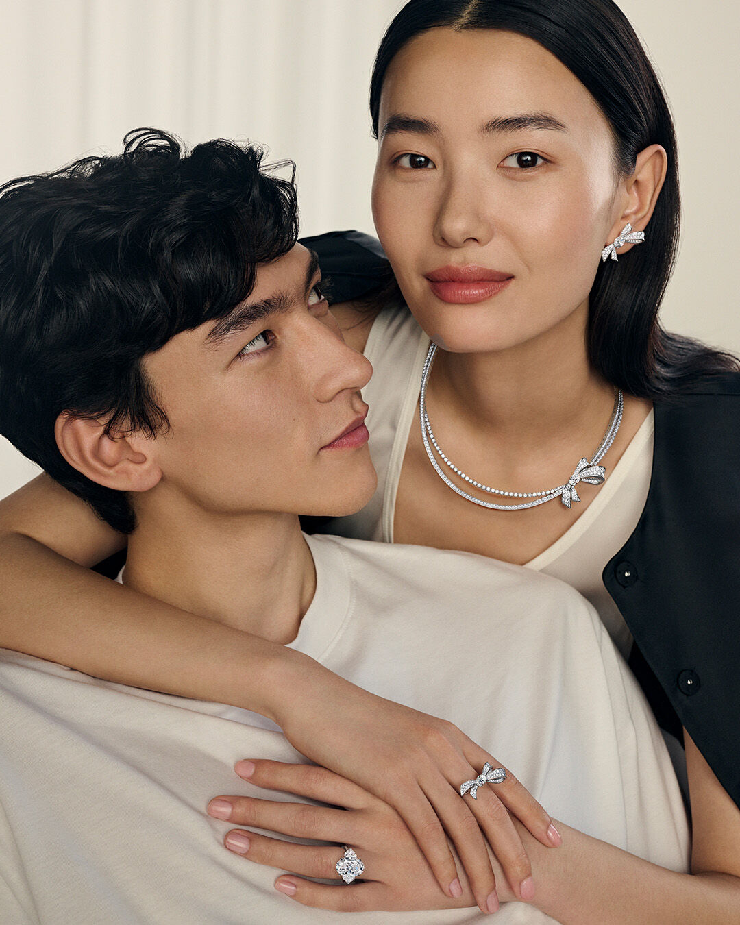 Valentine's Day - image shows model wearing heart shape diamond engagement ring, line bracelet and necklace