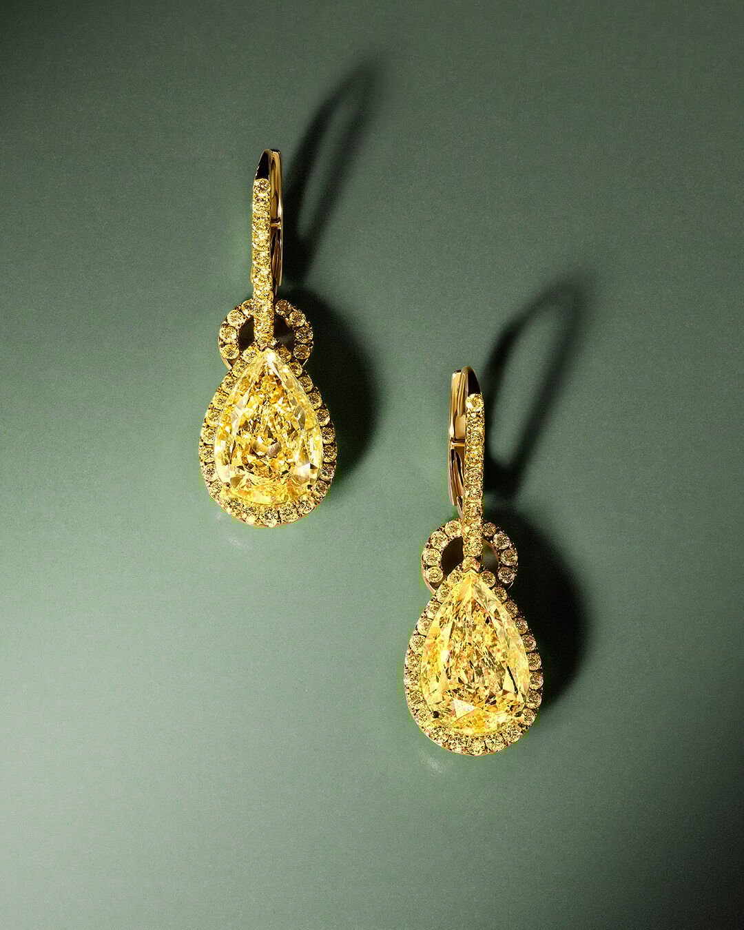 Image shows model wearing Laurence Graff Signature bangles and rings 