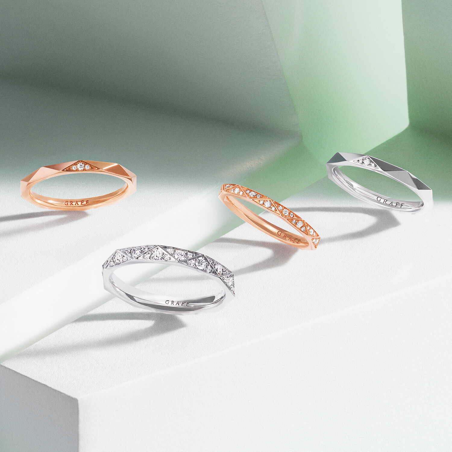 Image shows model hands wearing Laurence Graff Signature collection rings
