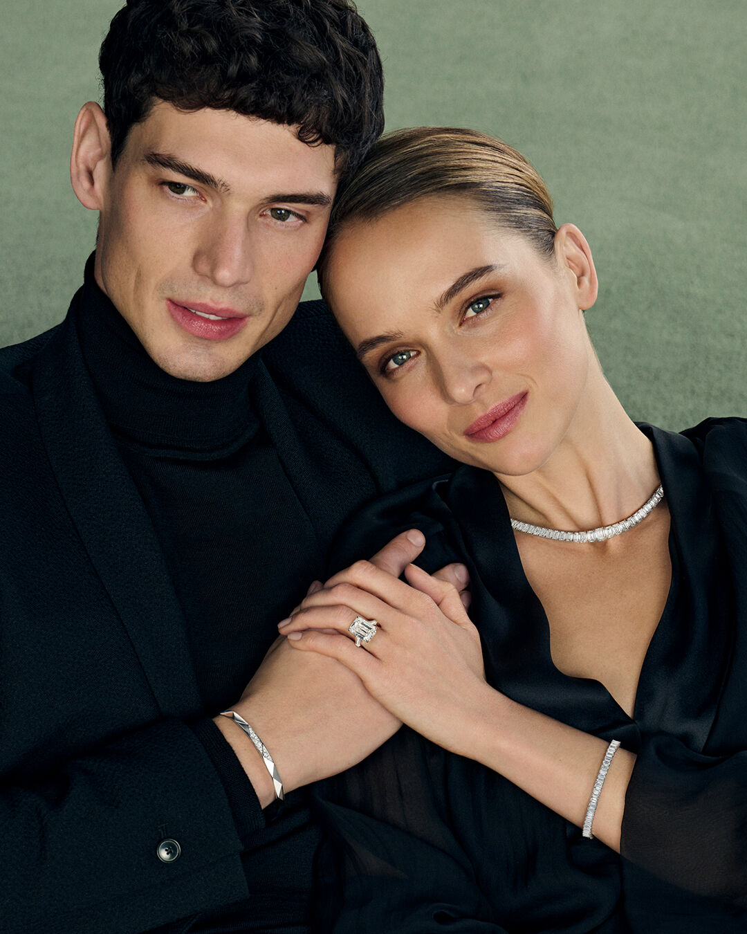 Image shows model wearing Laurence Graff Signature bangles and rings 