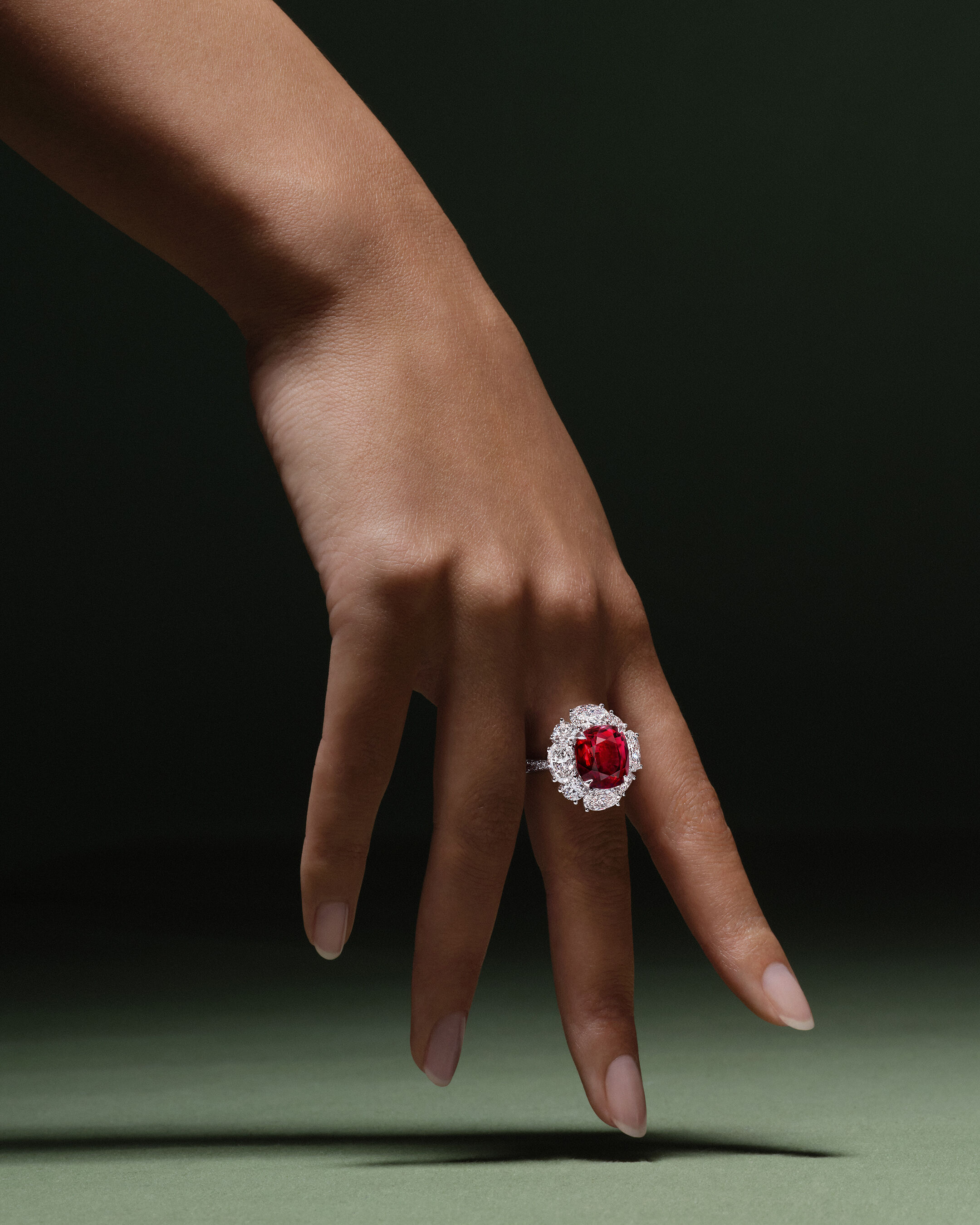 Image shows model wearing Laurence Graff Signature bangles and rings 