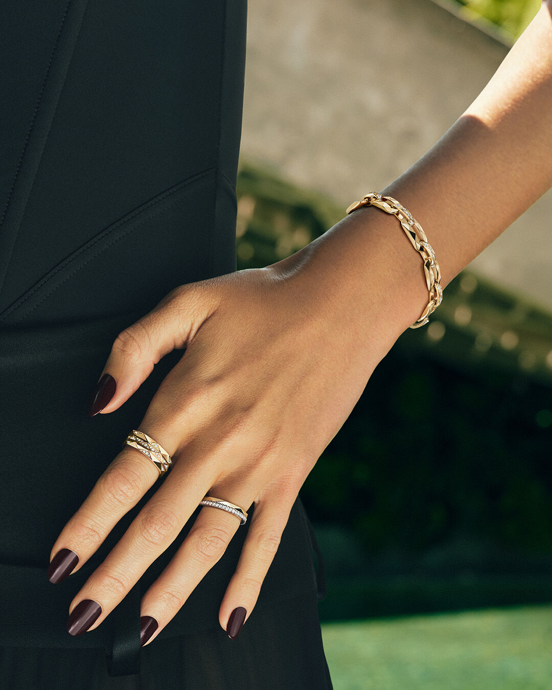 Image shows model wearing Laurence Graff Signature rings and bangles