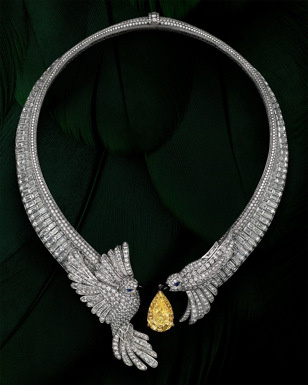 The Gift of Love - image shows Graff High Jewellery White and Yellow diamond necklace featuring two white diamond birds and a pear shape yellow diamond drop.