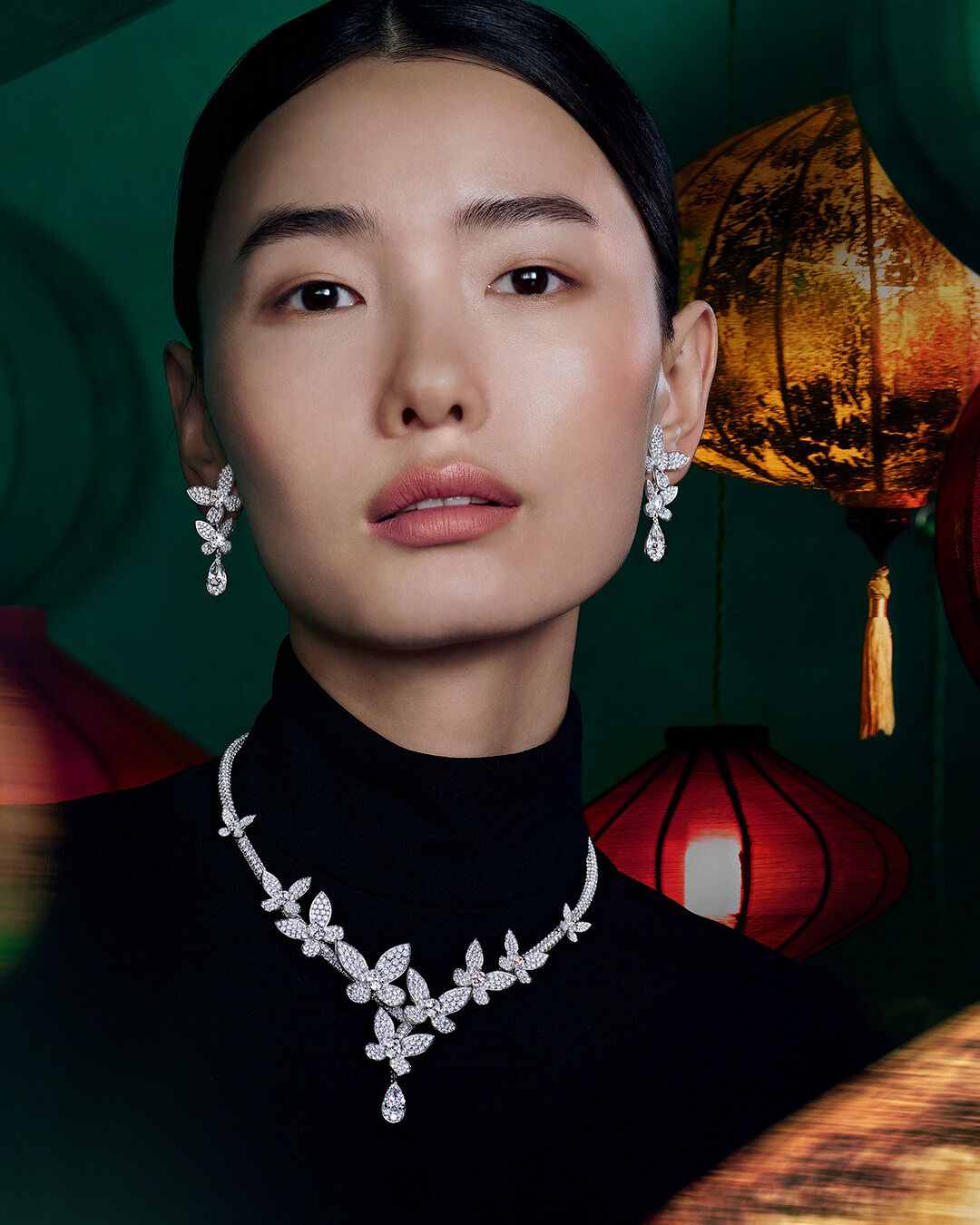 Image shows model wearing Graff Butterfly jewellery