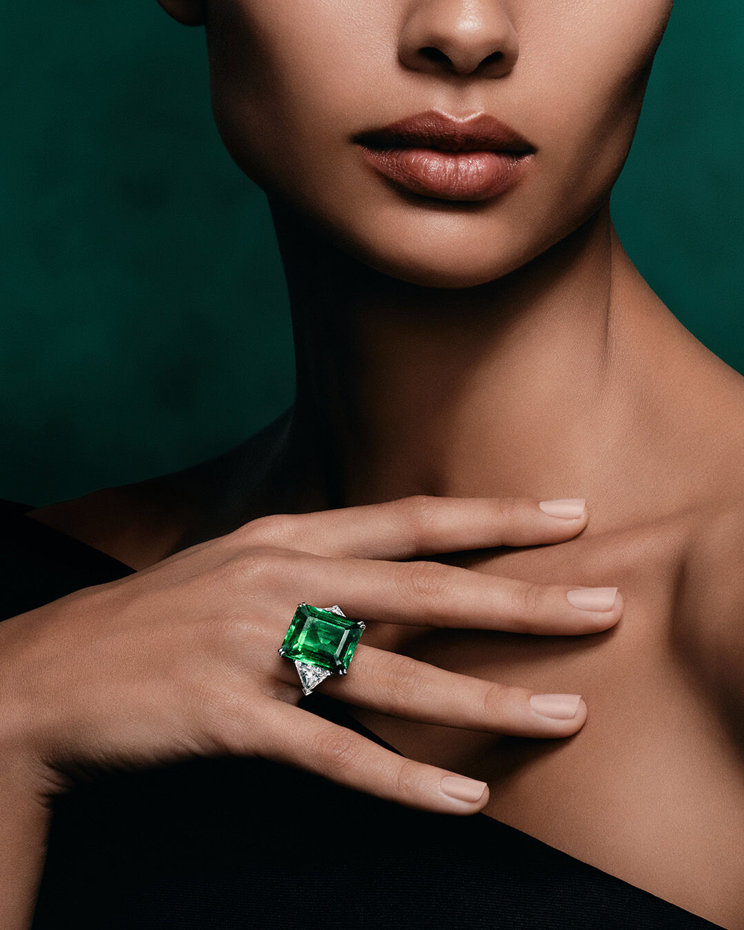 Image shows Graff Emerald and White Diamond High Jewellery bangle being created in Graff workshop