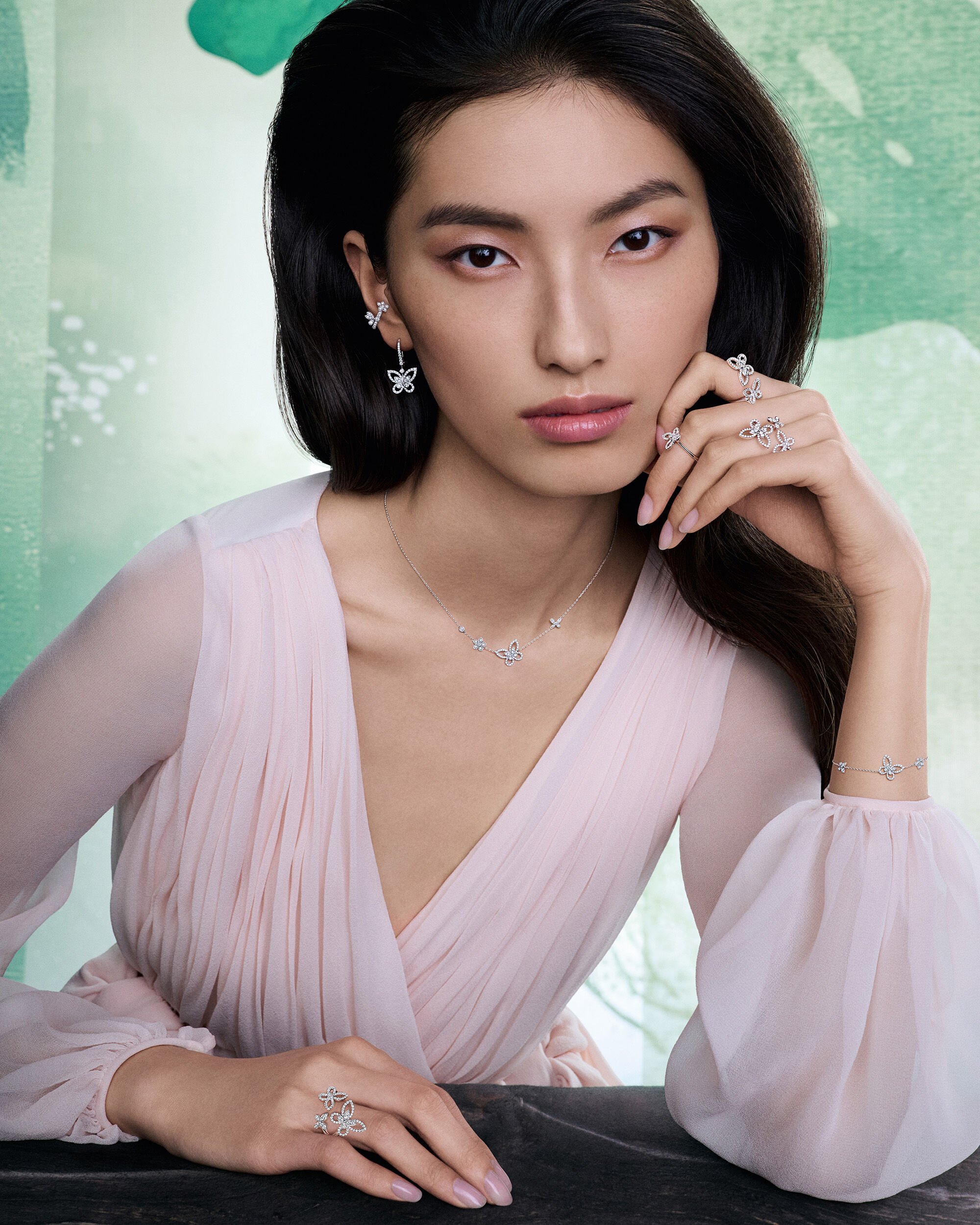 Image shows model wearing Graff Butterfly bracelet and ring