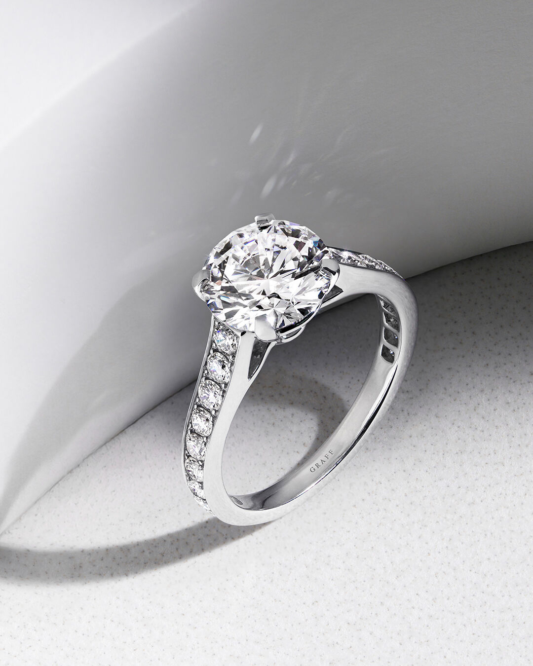 Image shows Graff Round Brilliant Diamond engagement ring.