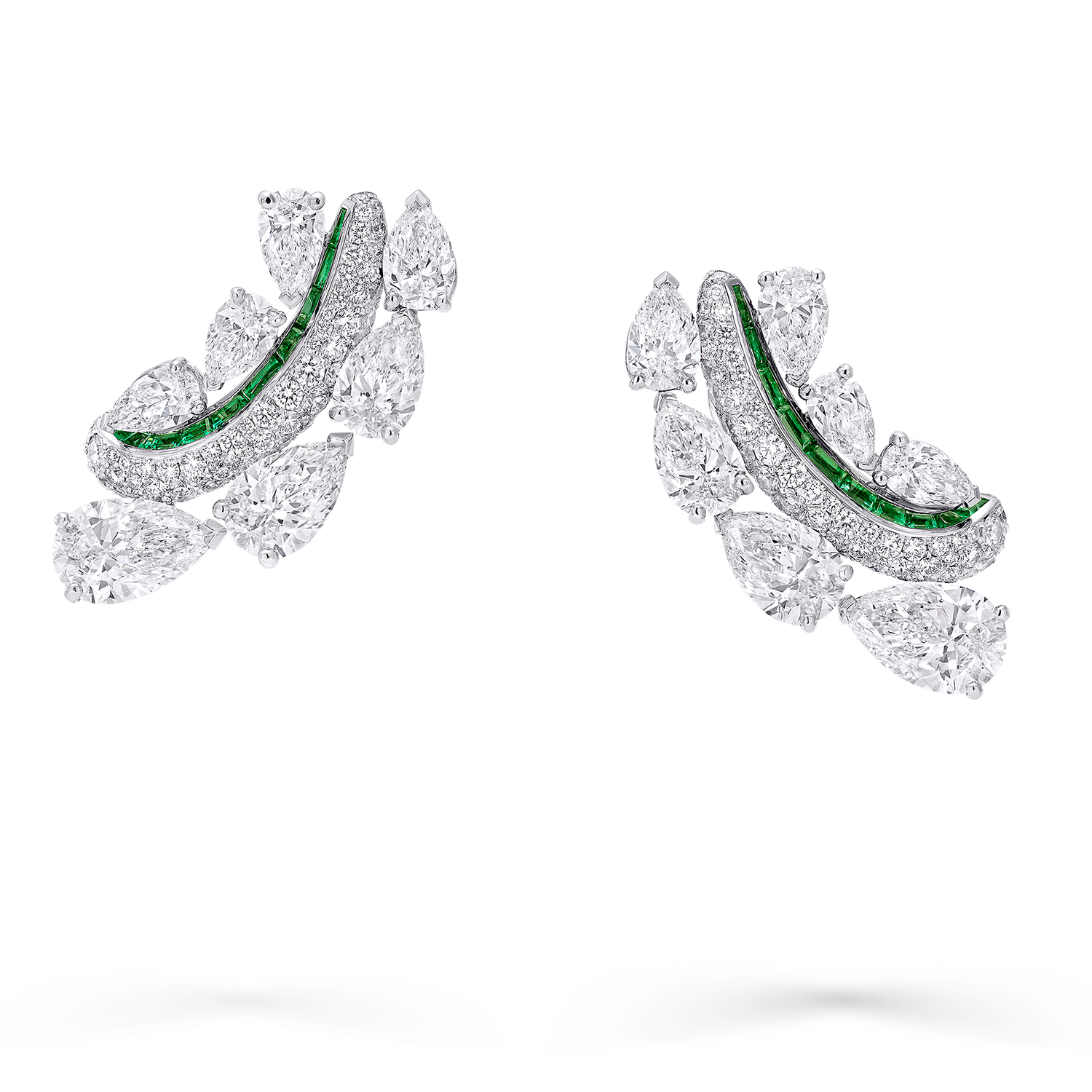 Image of Graff Emerald and White Diamond Solitaire ring being assembled in Graff workshop