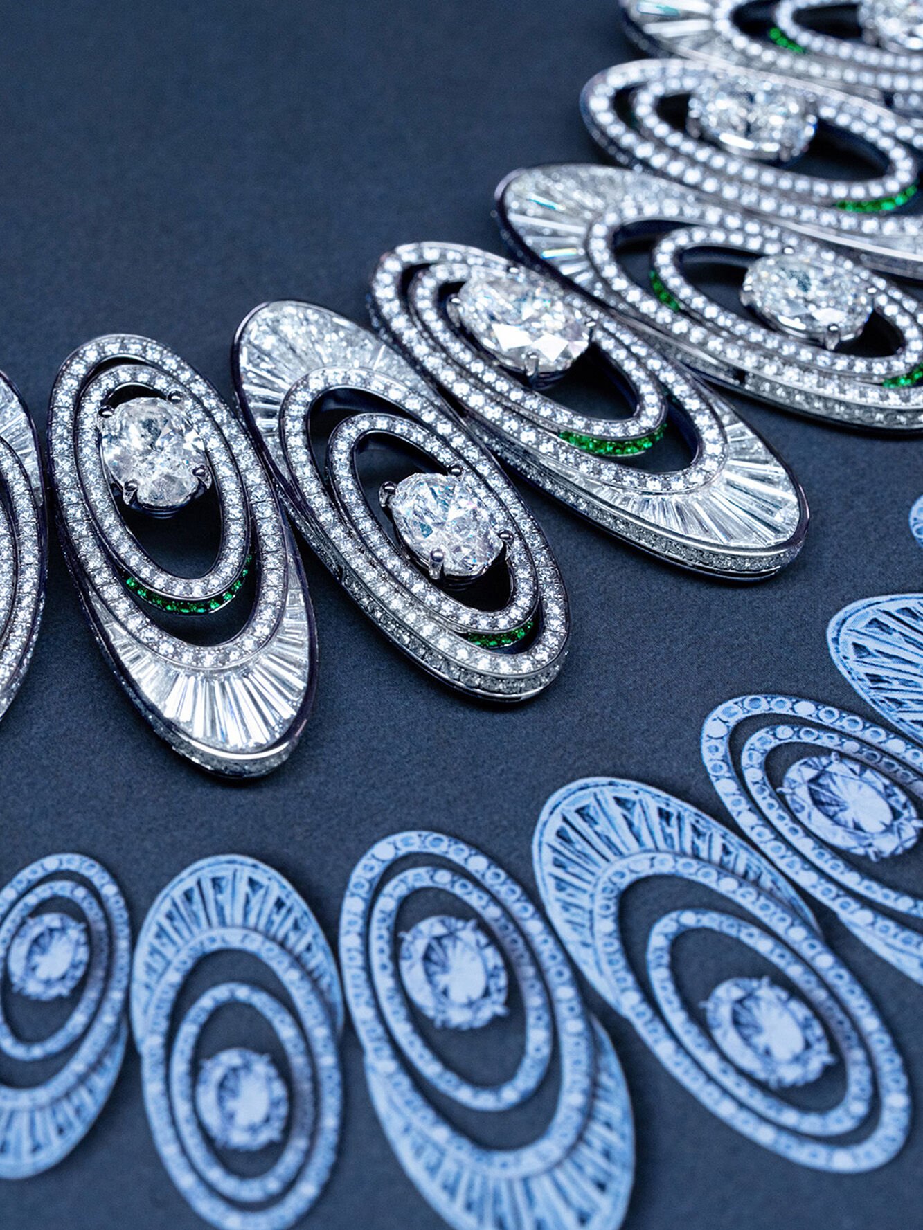 Graff 1963 High Jewellery Suite making of, image shows graff craftsman creating necklace in workshop