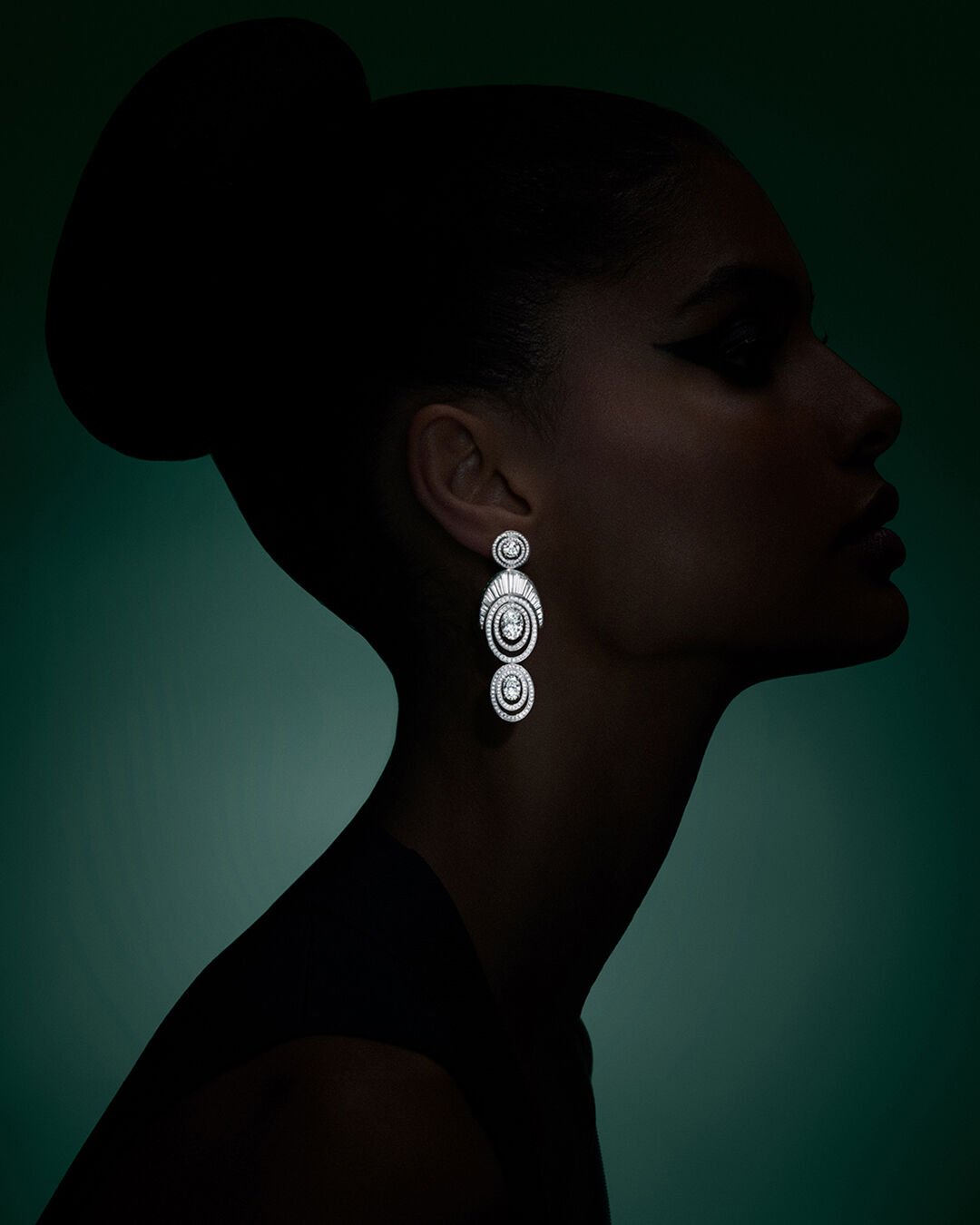 Image shows model wearing Graff 1963 White Diamond Earrings