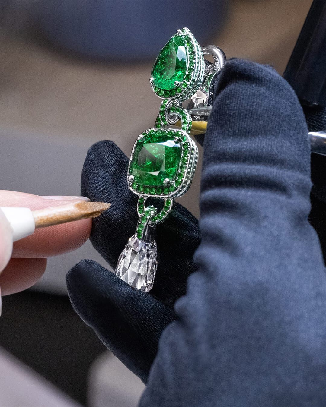 Image of Graff Emerald and White Diamond Solitaire ring, side view