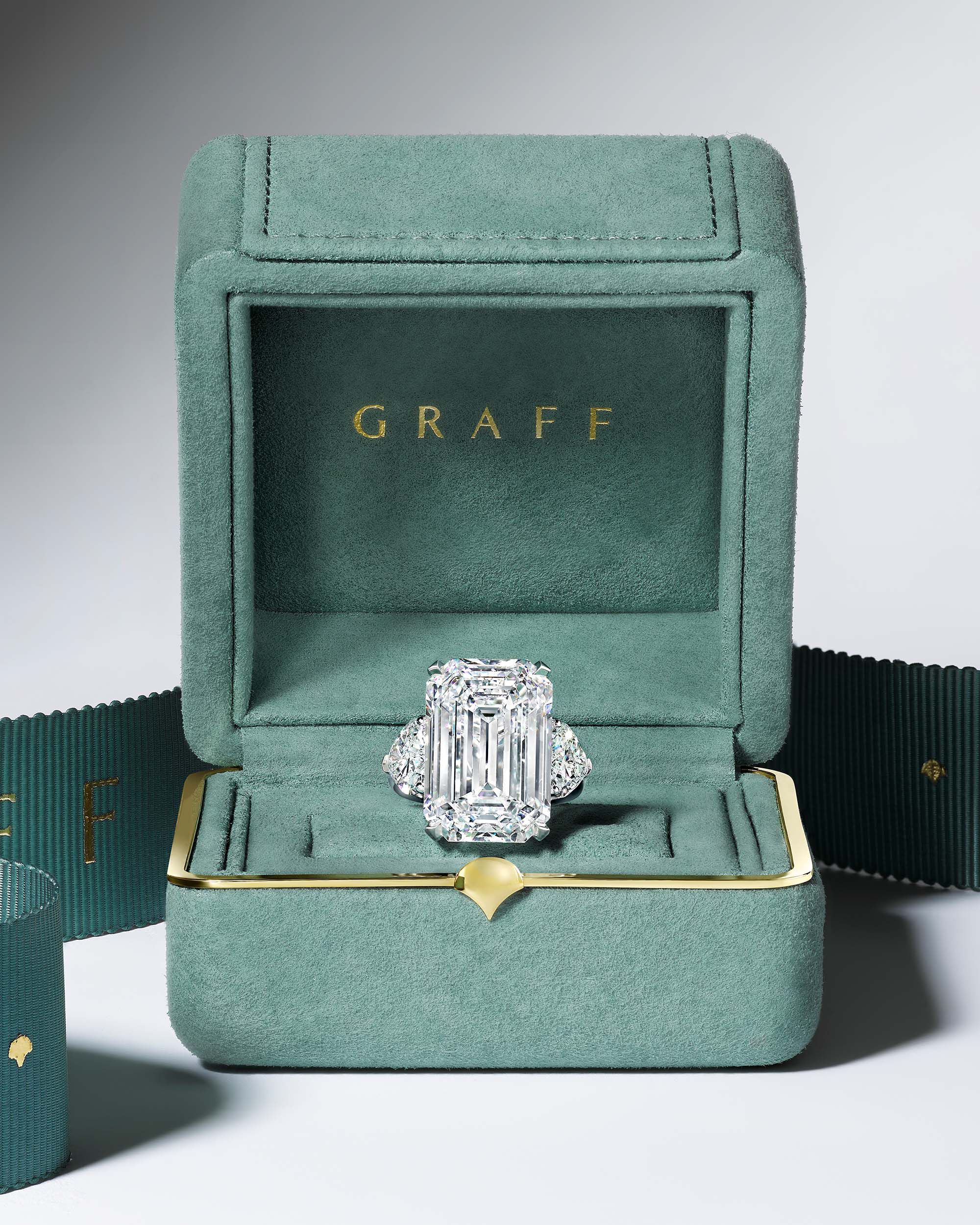 Close up of a Graff diamond engagement ring in a jewellery box