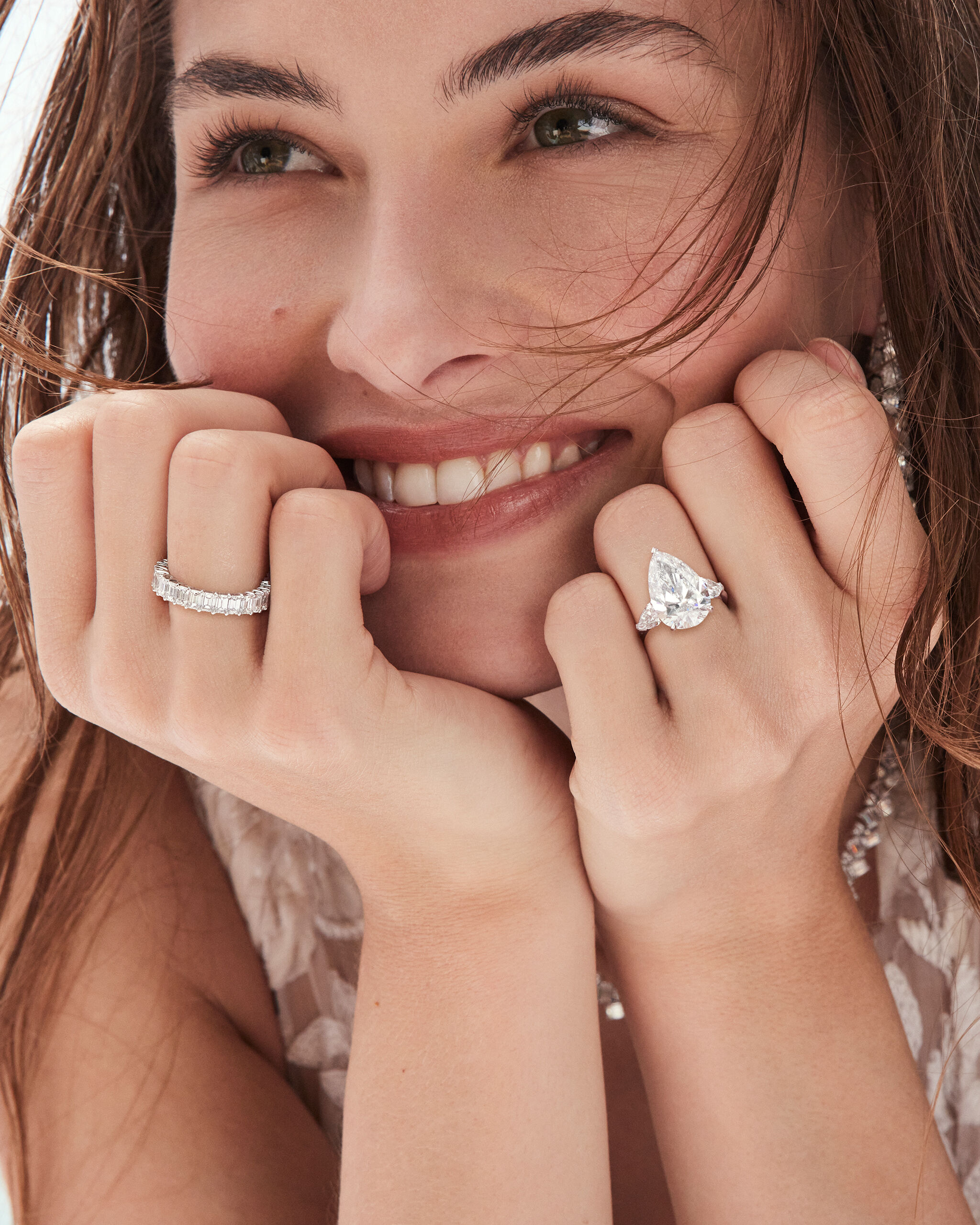 Model wearing Graff Diamond Engagement Ring and Diamond Wedding Band