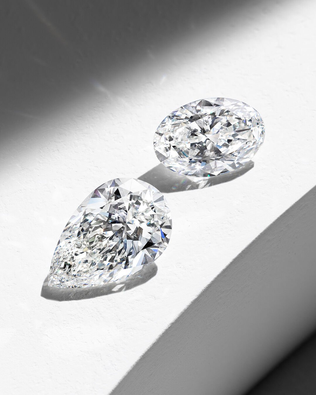 Guide to diamond clarity - image shows loose Graff pear shape and oval cut diamonds