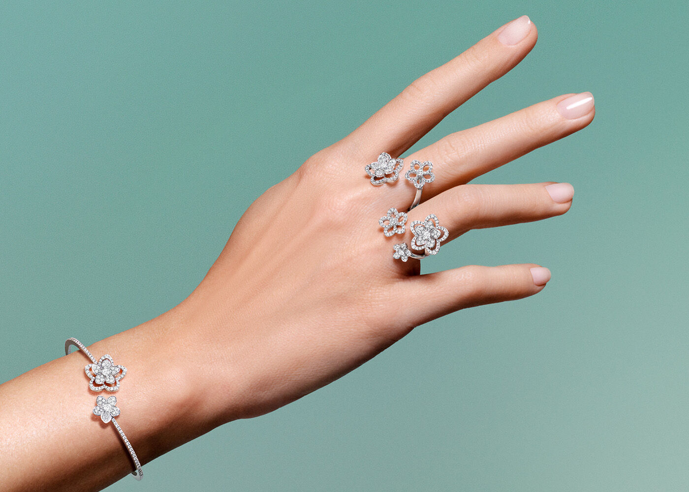 Image model hands wearing Wild Flower ring and bracelet
