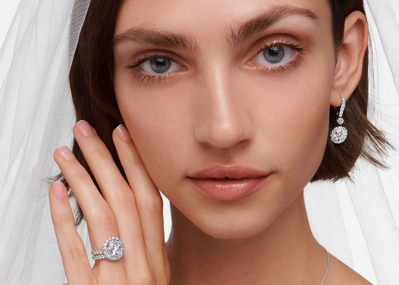 Wedding rings for women - model wears classic wedding jewellery from Graff
