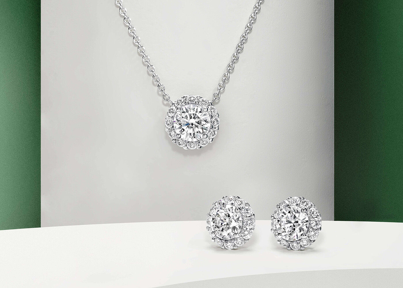 Image shows Icon Round Diamond Necklace and Icon Round Diamond Stud Earrings