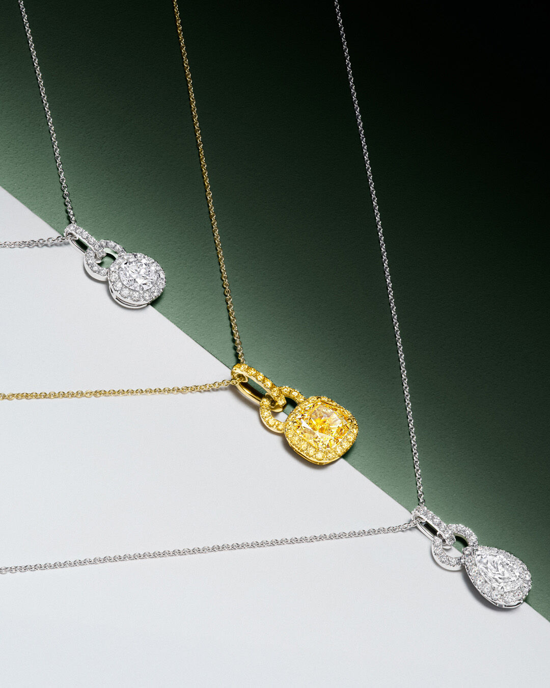 Image shows model wearing Laurence Graff Signature bangles and rings 