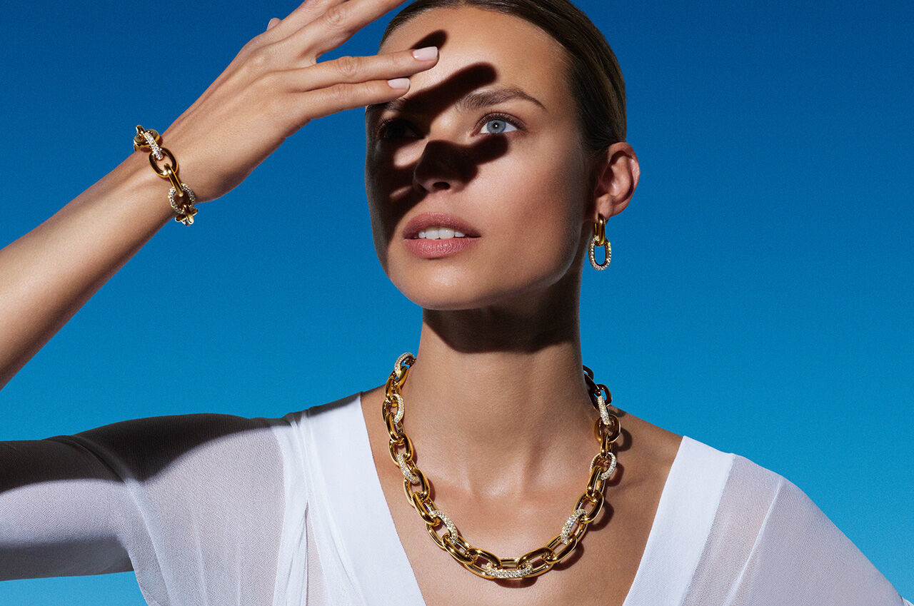 Graff Endless Summer Collections - Model wears Graff Yellow Gold and Diamond Be Together Bracelets, Necklace and Earrings