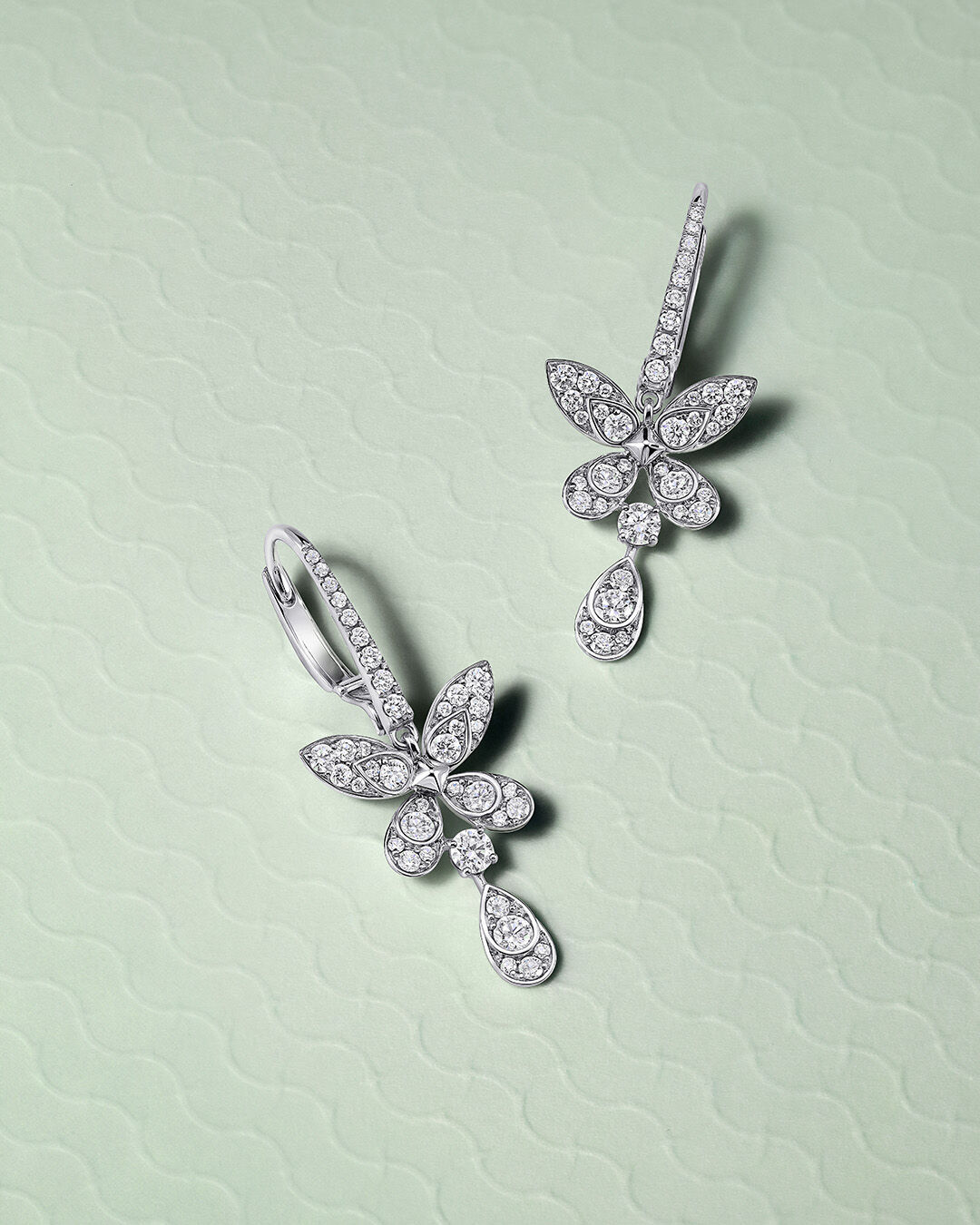 Image shows Pav&eacute; Butterfly Diamond Drop Earrings