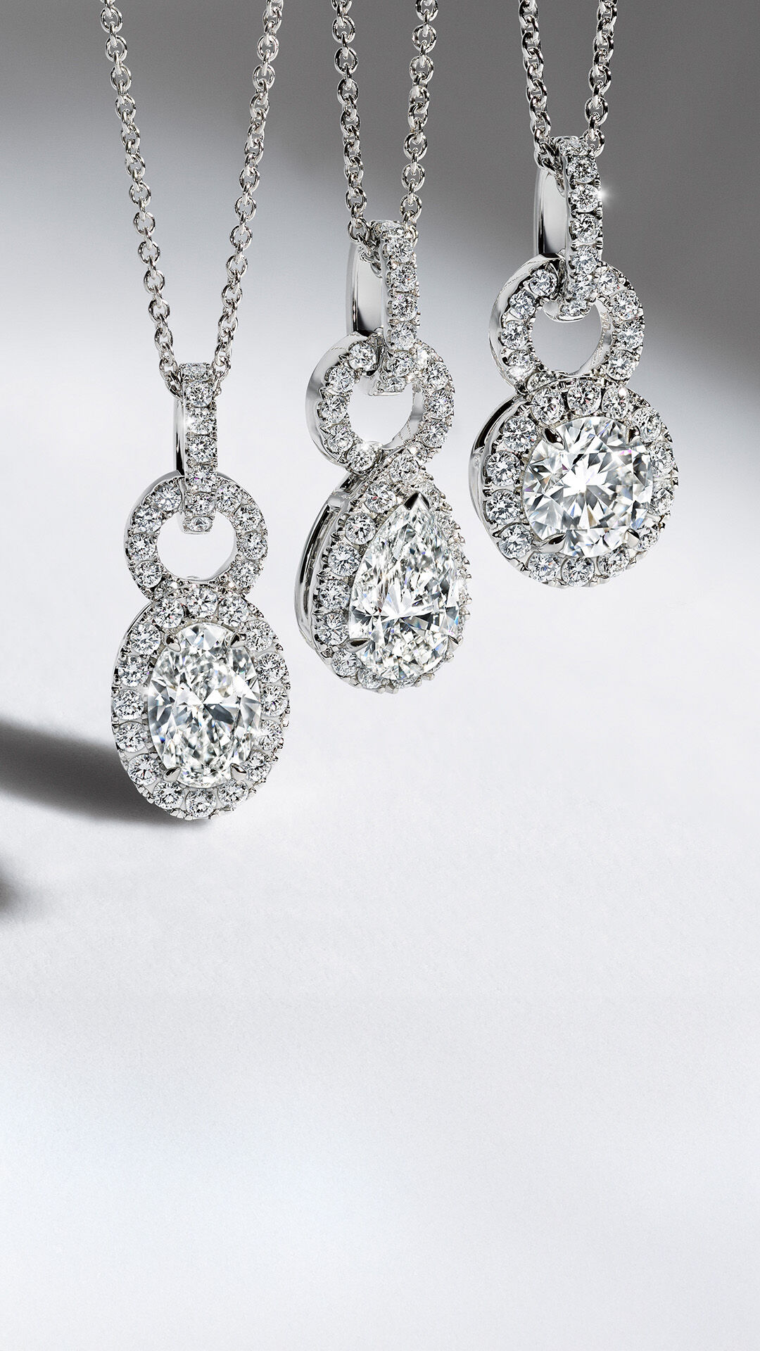 Laurence Graff Signature - image shows models wearing Laurence Graff Signature collection jewellery