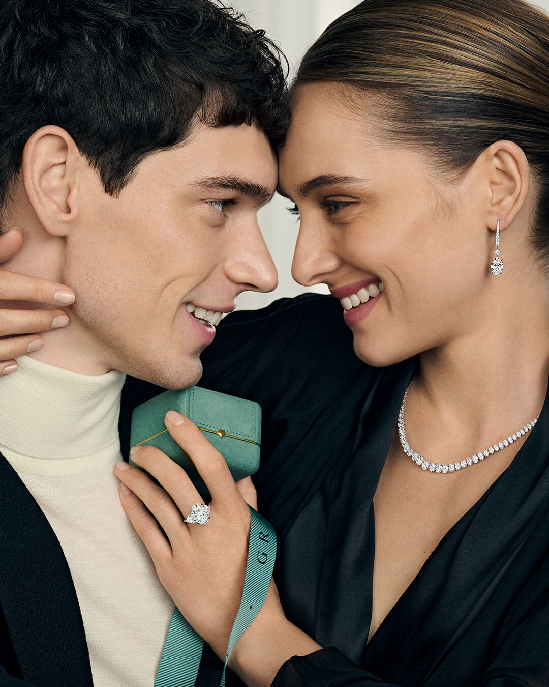 Image shows model wearing Graff Oval cut diamond jewellery