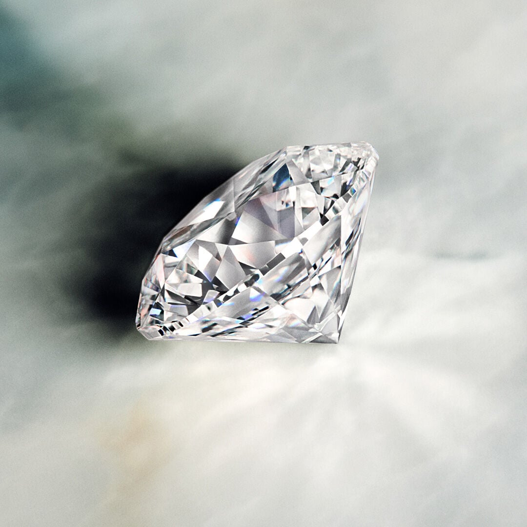 A guide to Diamond Colour - image shows Graff diamond engagement ring and workshop tools