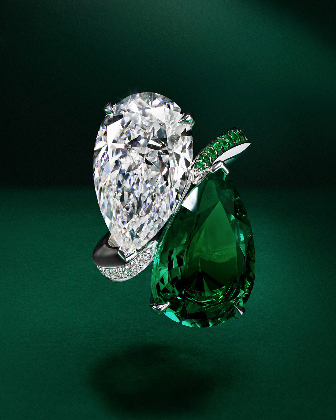 Image shows Graff Emerald and White Diamond High Jewellery bangle