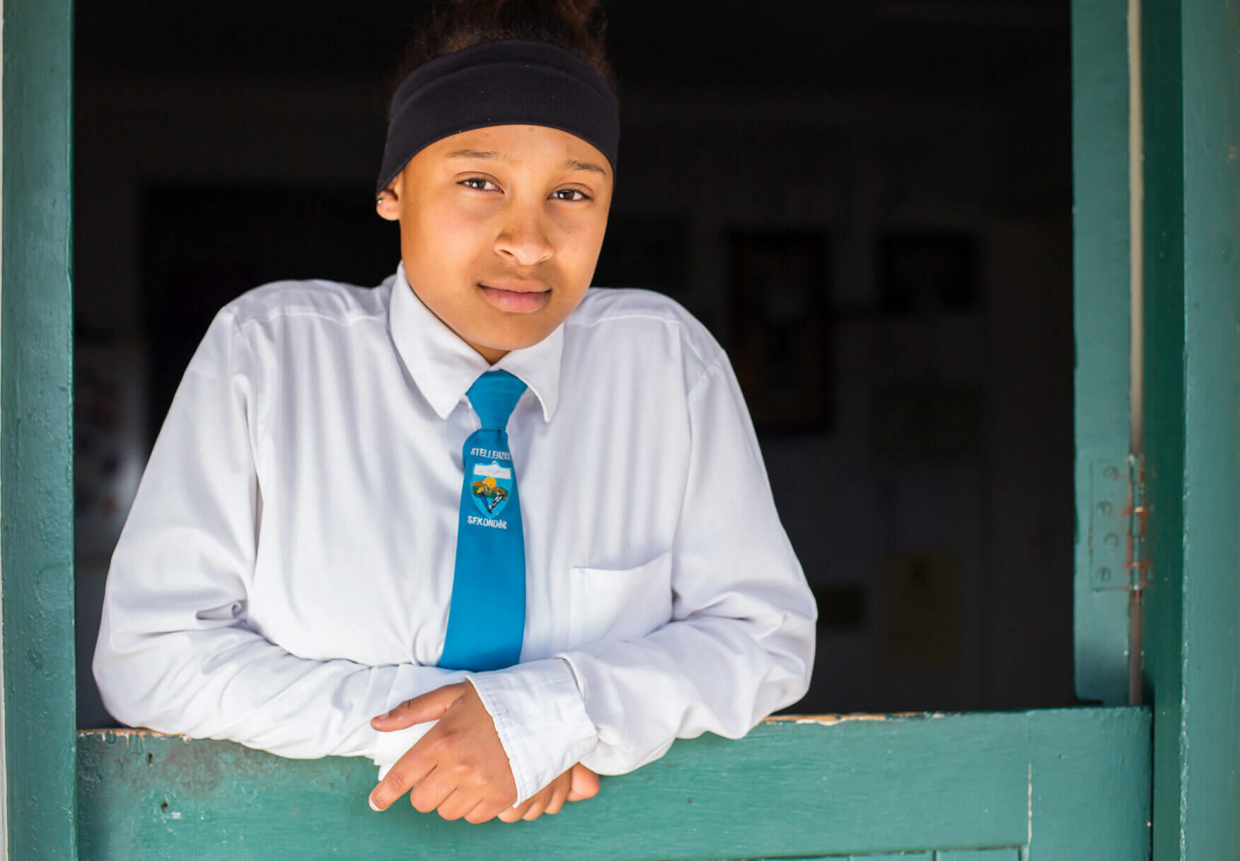A girl in South Africa&rsquo;s Cape winelands getting help from the the Pebbles Project