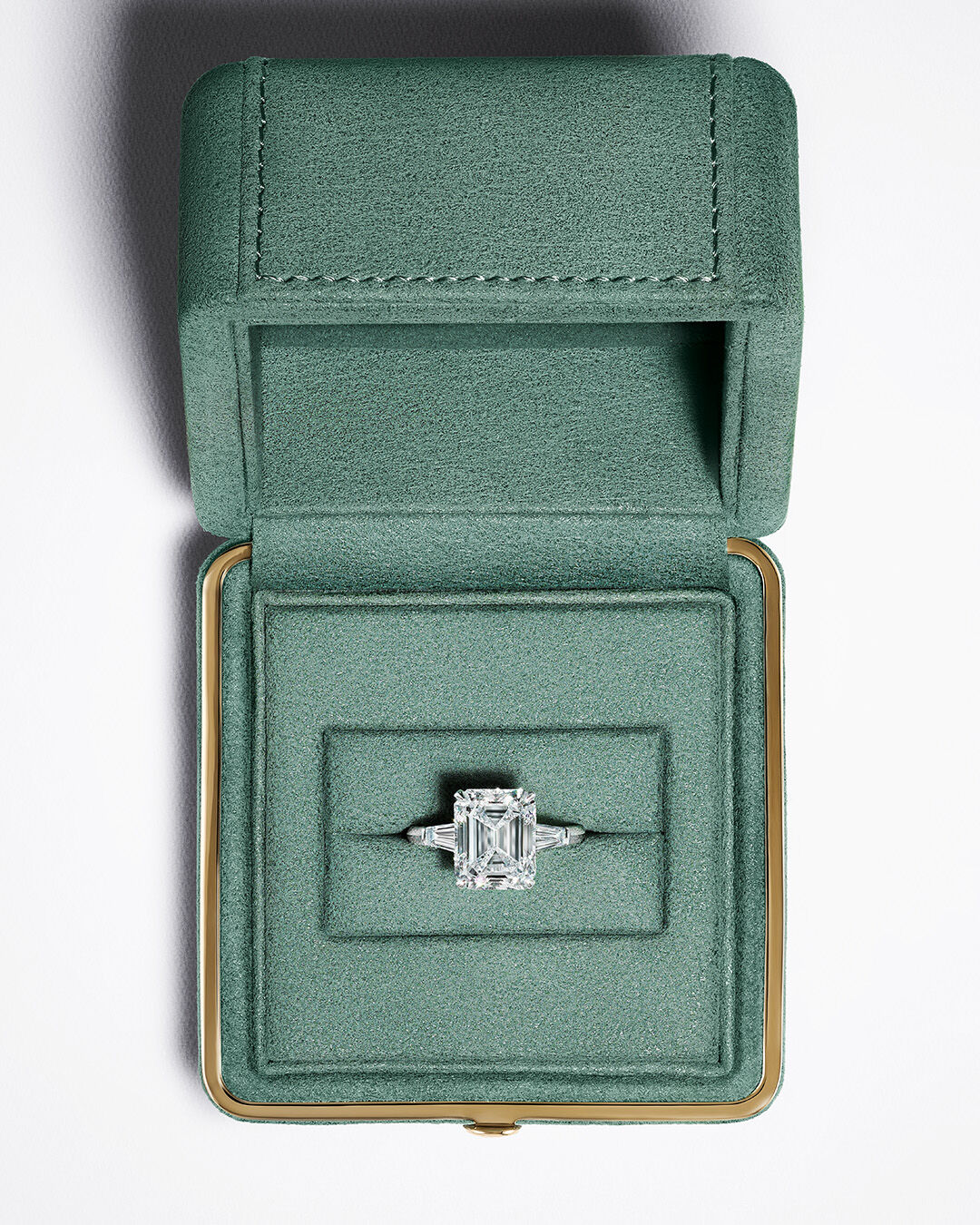 Engagement Rings - image shows Graff Emerald Cut Promise Engagement Ring in Graff ring box