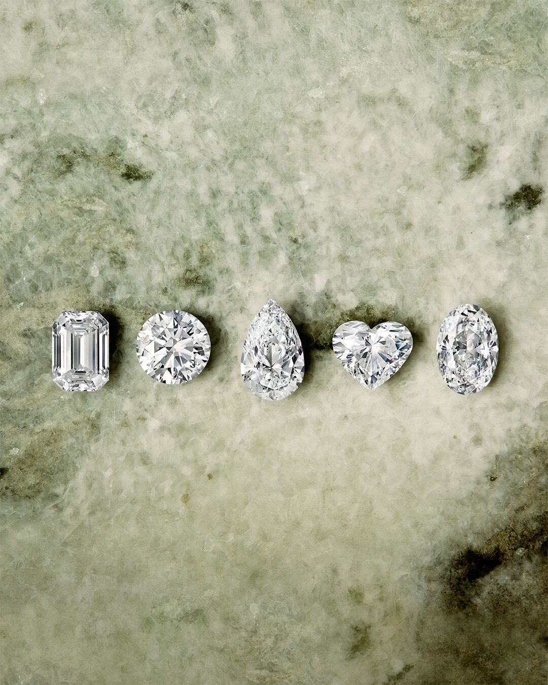 A Guide to Diamond Cuts and Diamond Shapes - image shows loose Graff diamond of different cuts and shapes